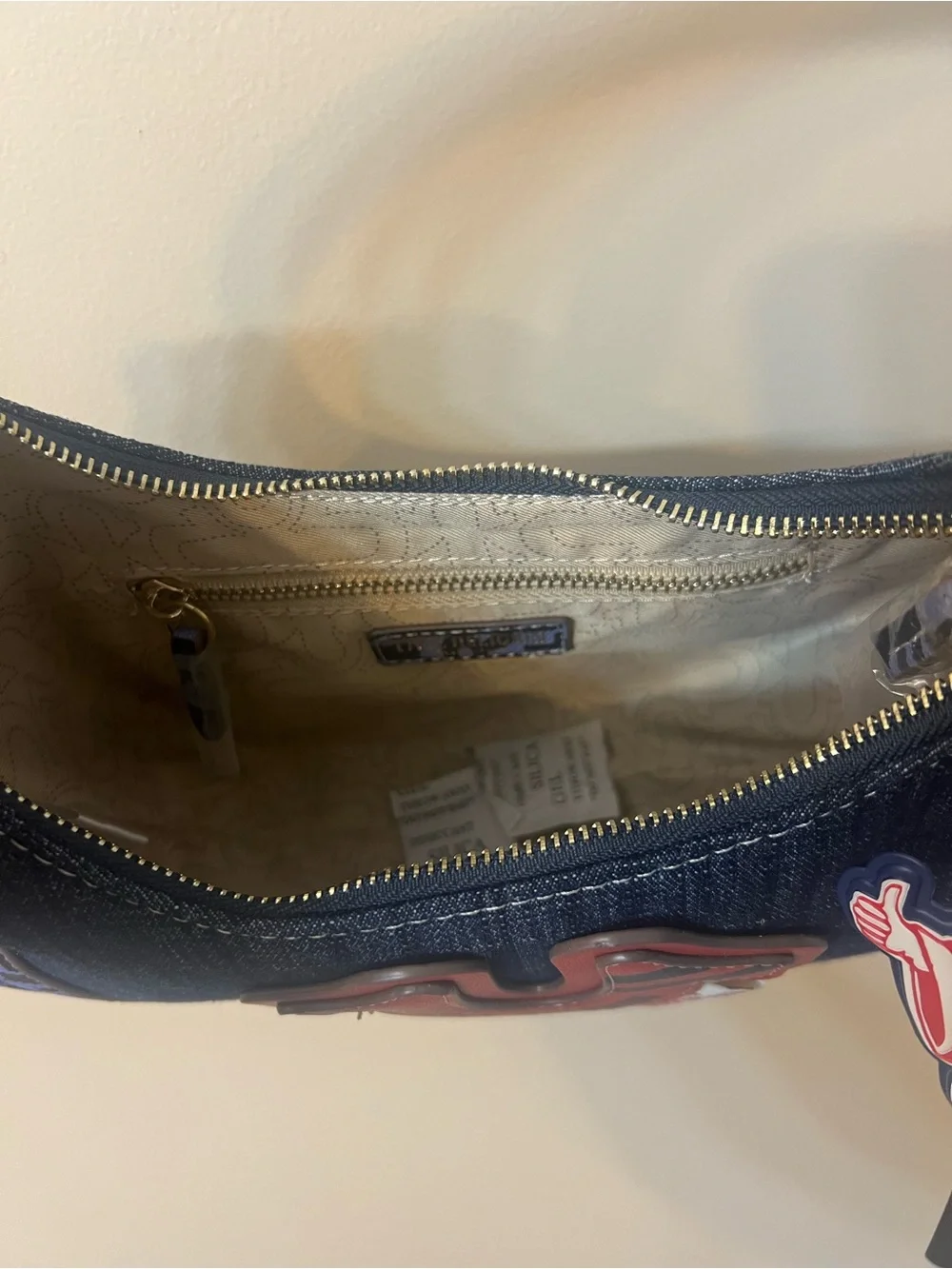 True Religion Navy Denim Shoulder Bag with Red Patch Accent